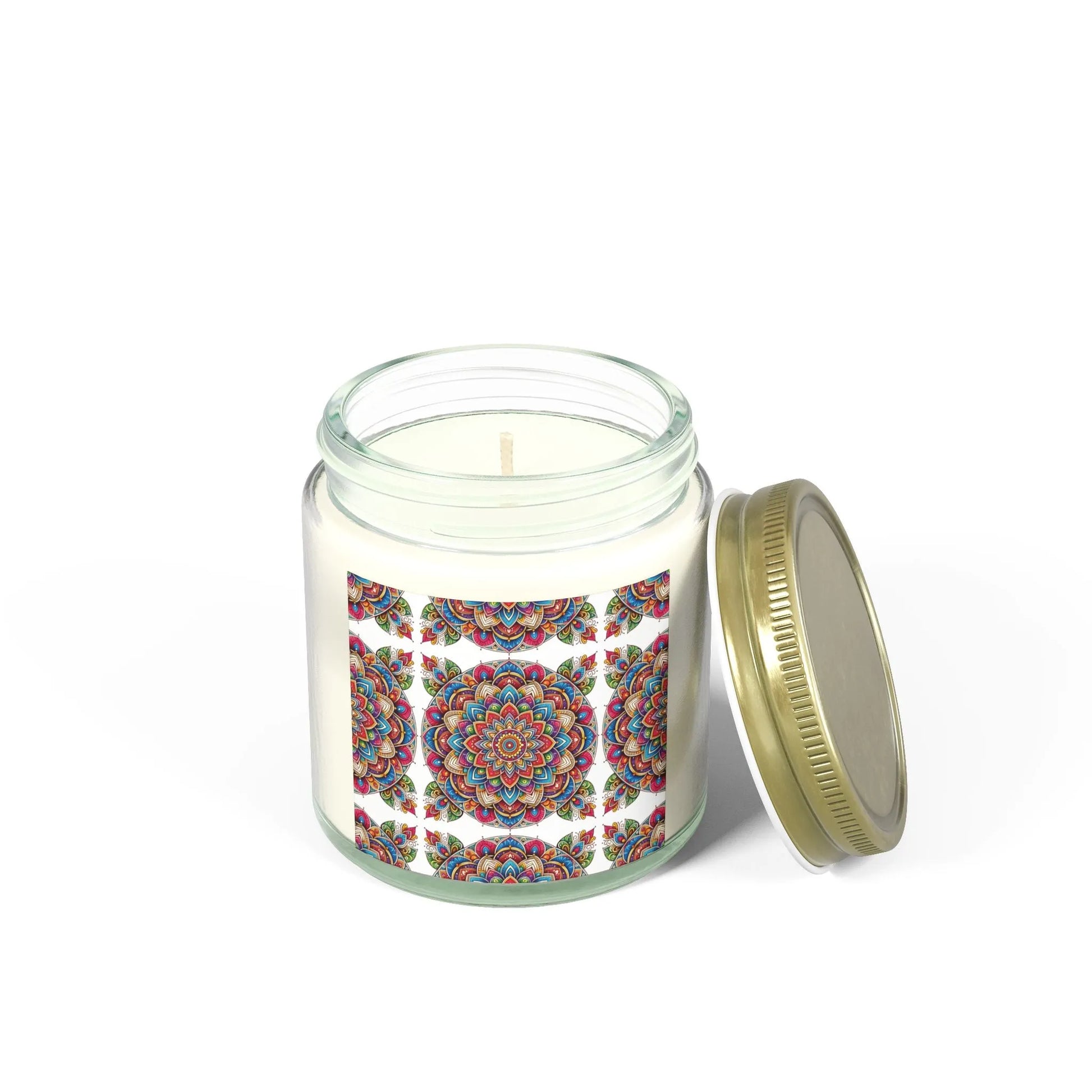 The Aromatherapy Candle Essential Oil by Printify, designed for yoga enthusiasts, is housed in a glass jar with a decorative lid and showcases a vibrant mandala pattern on its label. The eco-friendly wax exudes elegance, as the lid sits next to the jar on a pristine white surface, ready to offer moments of aromatherapy bliss.