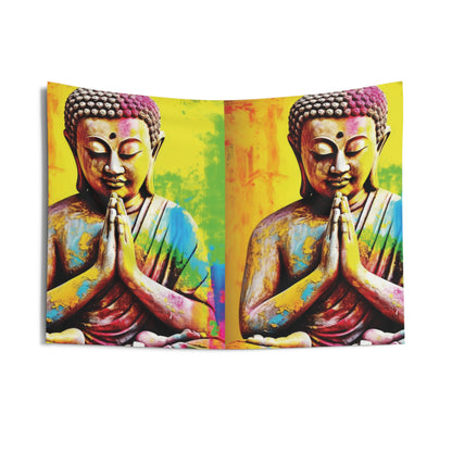 The Printify Colorful Buddha Tapestry features a symmetrical design with two statues in prayer, making it ideal for meditation rooms or yoga studios. Its vibrant background is filled with splashes of yellow, blue, and pink.