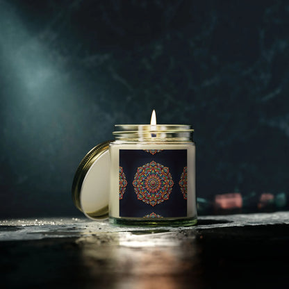 A lit Zen Candle from Printify, featuring an intricate mandala pattern on the label and crafted from eco-friendly coconut apricot wax, stands elegantly in its glass jar with the lid leaning gently against it. In the dark background, a soft light highlights its Meditation Aroma scent, making it perfect for relaxation.