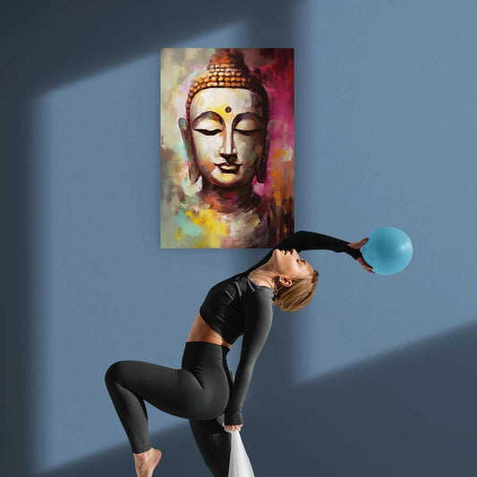 A woman in activewear performing a backbend with a blue exercise ball, beneath an abstract Buddha painting.