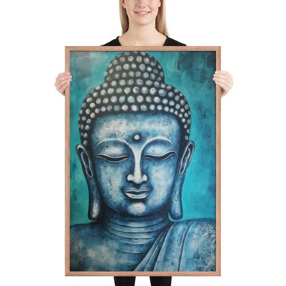 A woman with a bright smile is holding a red oak framed poster depicting a serene blue Buddha head against a textured teal background, blending spiritual calm with rich, modern colors.