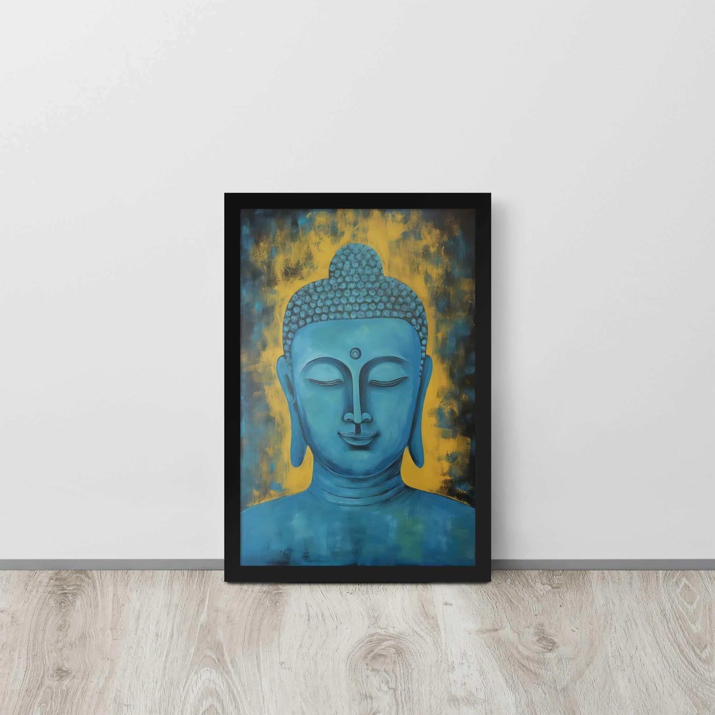 A black oak framed poster displays a Blue Buddha Healing Tibetan Art against a golden yellow background with dark, leaf-like impressions, creating a serene and contemplative artwork, propped on a light wooden floor against a white wall.