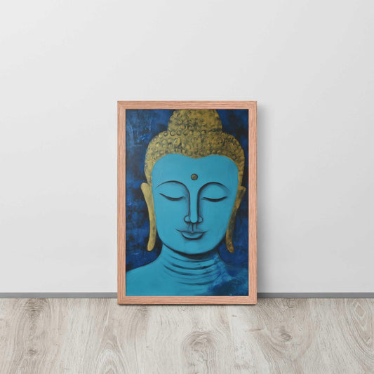 A framed poster with a red oak finish features a serene Blue Buddha Zen Wall Art with golden touches, set against a darker blue backdrop with a rich, textural finish, positioned on a light wooden floor by a plain white wall.