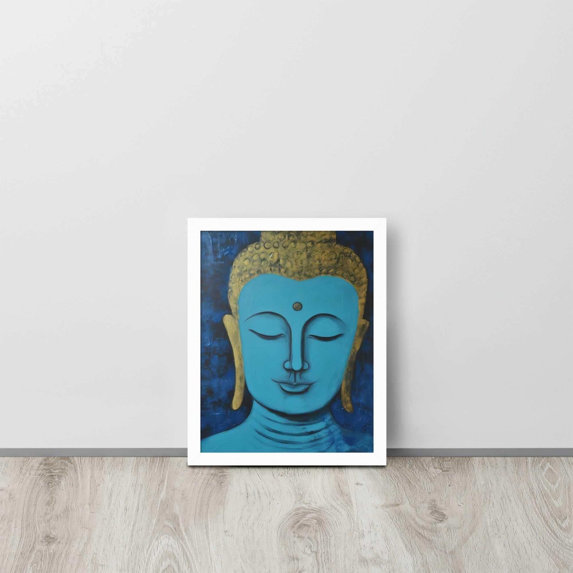 A framed poster with a white oak finish features a serene Blue Buddha Zen Wall Art with golden touches, set against a darker blue backdrop with a rich, textural finish, positioned on a light wooden floor by a plain white wall.