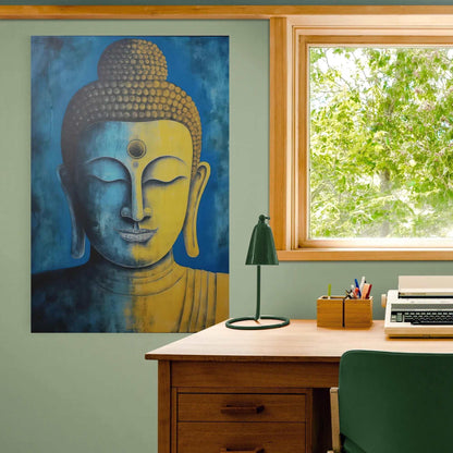 "Serene blue and gold Buddha artwork on a sage green wall in a cozy home office with a wooden desk, green chair, and typewriter."