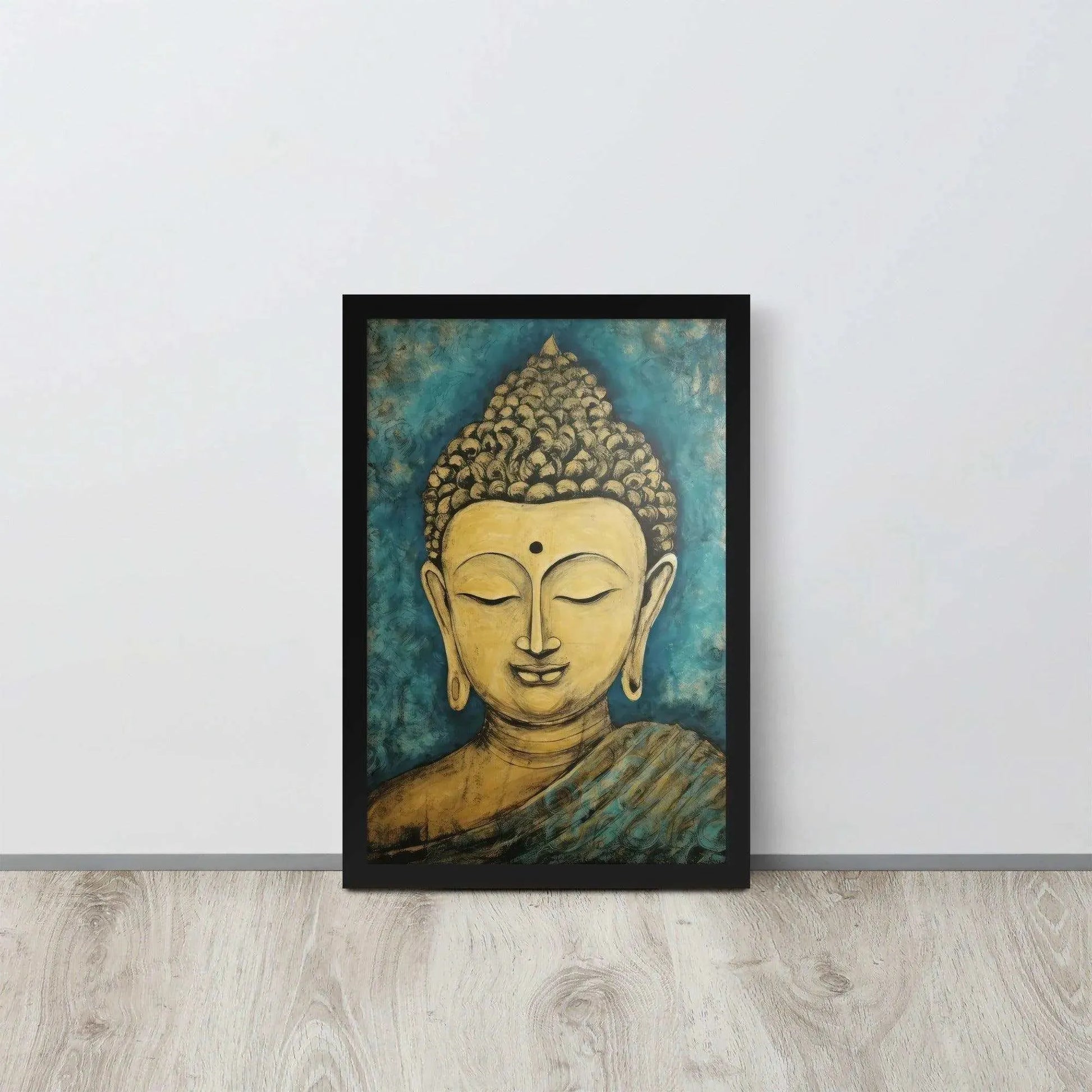 A black oak framed poster on a light wooden floor features a Golden Buddha Zen Wall Art with a tranquil expression, set against an abstract blue textured background, conveying a sense of peace and introspection beside a white wall.