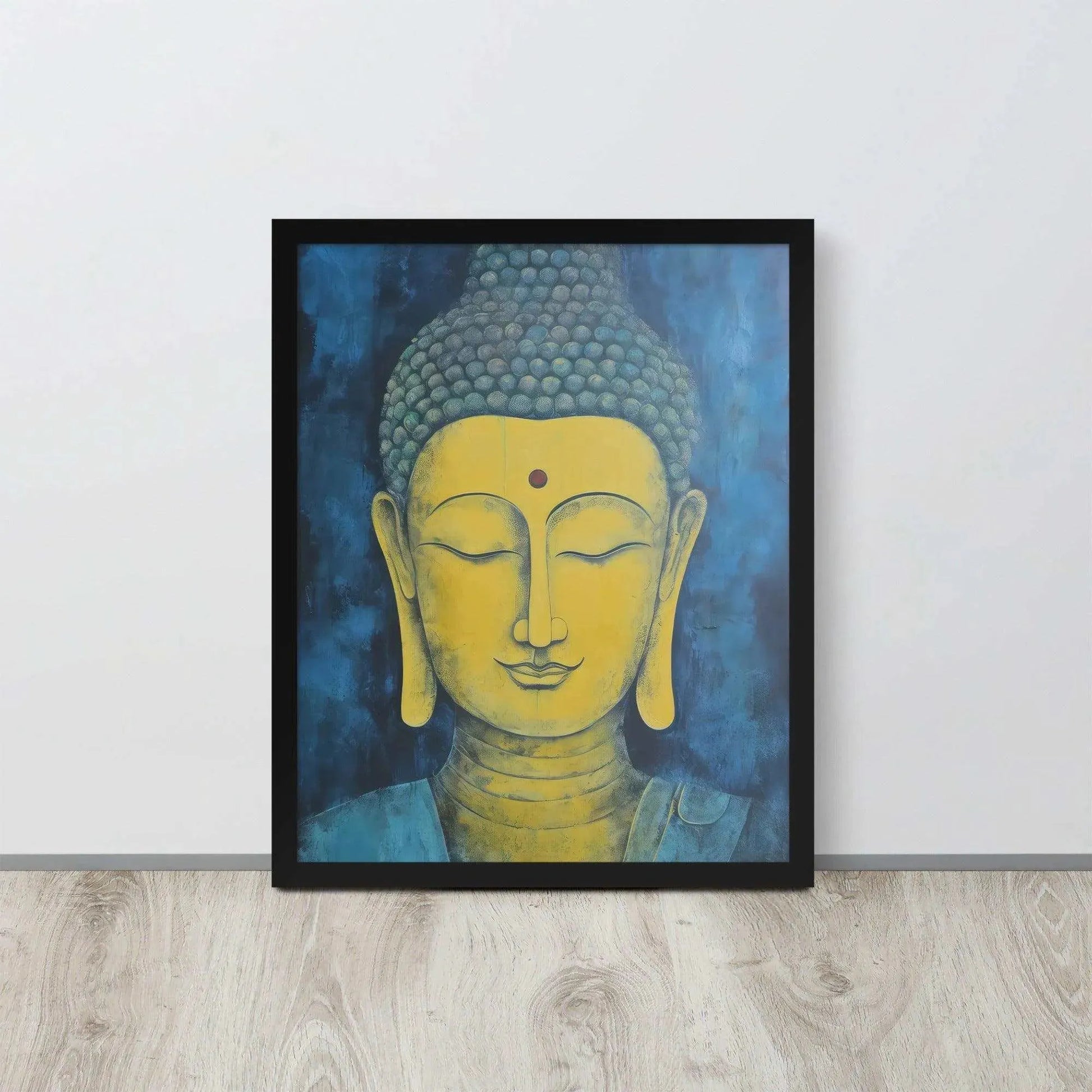 A black-Golden Happy Buddha Framed Print placed on a wooden floor against a white wall features a golden Buddha head with a serene expression, set against a deep blue textured background, creating a focal point of tranquility and spirituality in the room.