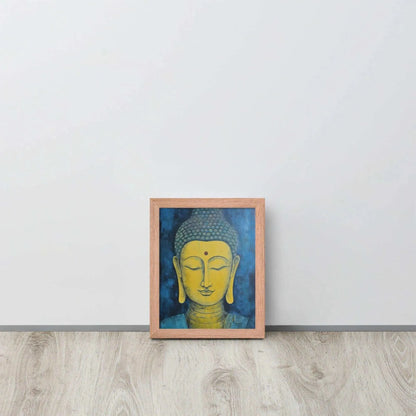 A red-Golden Happy Buddha Framed Print placed on a wooden floor against a white wall features a golden Buddha head with a serene expression, set against a deep blue textured background, creating a focal point of tranquility and spirituality in the room.