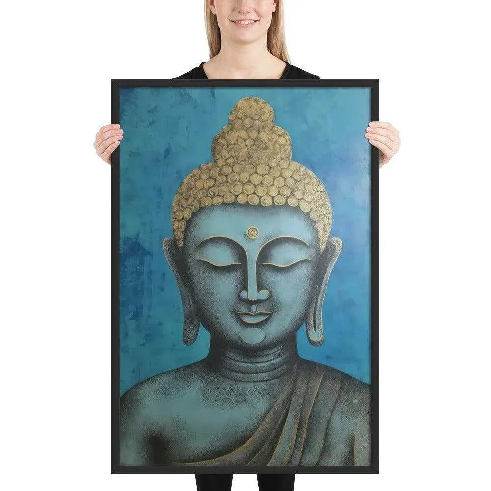 A beaming woman is holding a black-Happy Buddha Framed Print that features a Buddha head painted in shades of blue and gold against a textured blue background, exemplifying a fusion of traditional iconography with a modern artistic twist.