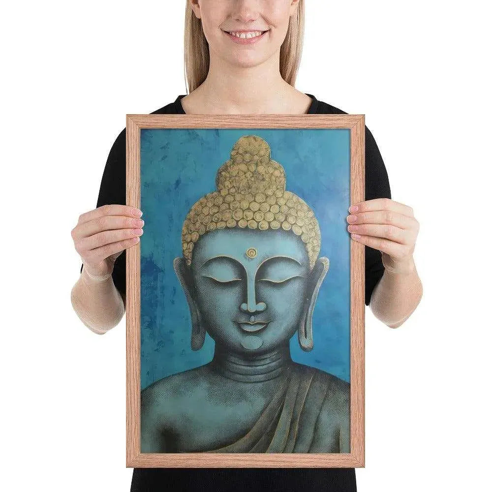 A beaming woman is holding a red-Happy Buddha Framed Print that features a Buddha head painted in shades of blue and gold against a textured blue background, exemplifying a fusion of traditional iconography with a modern artistic twist.