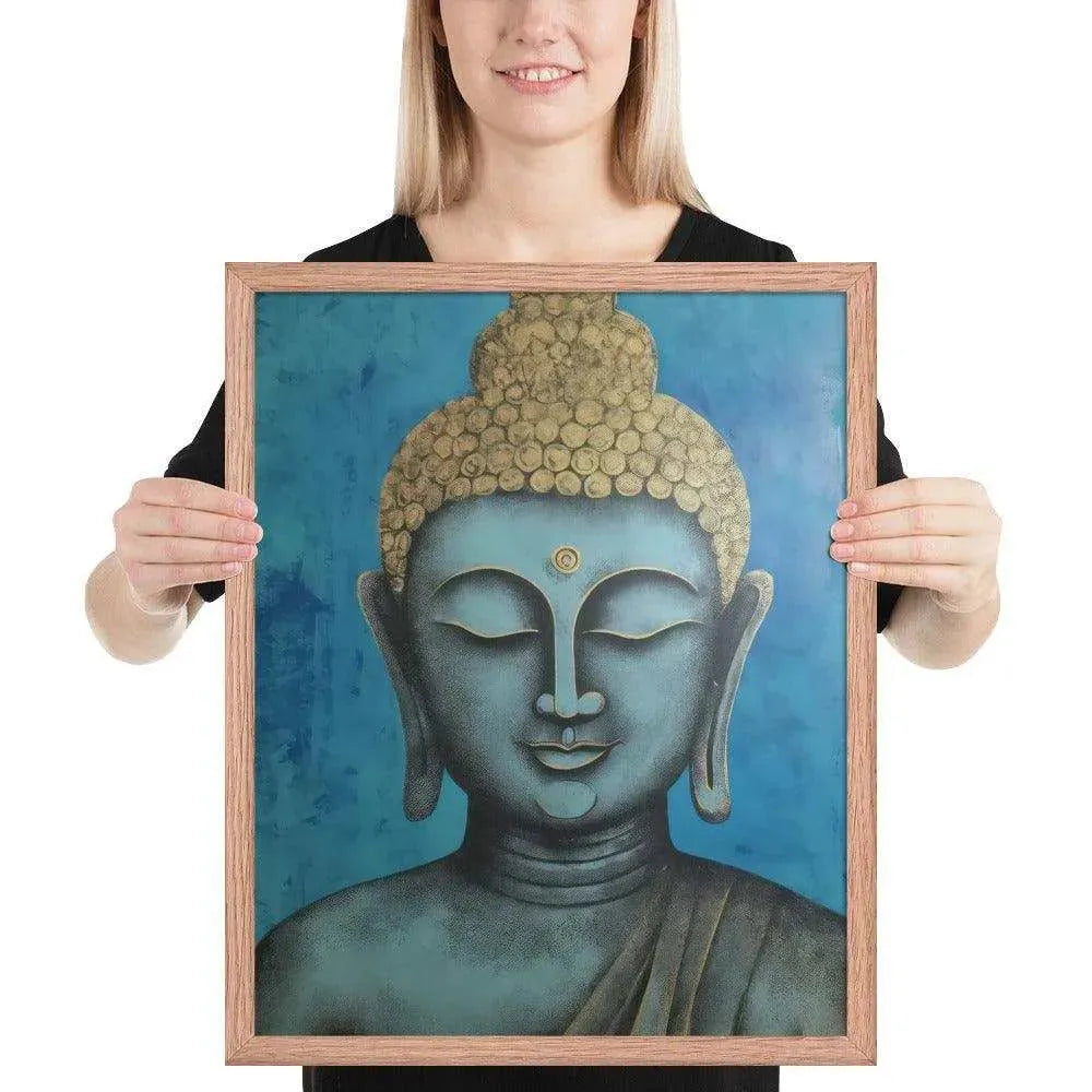 A beaming woman is holding a red-Happy Buddha Framed Print that features a Buddha head painted in shades of blue and gold against a textured blue background, exemplifying a fusion of traditional iconography with a modern artistic twist.