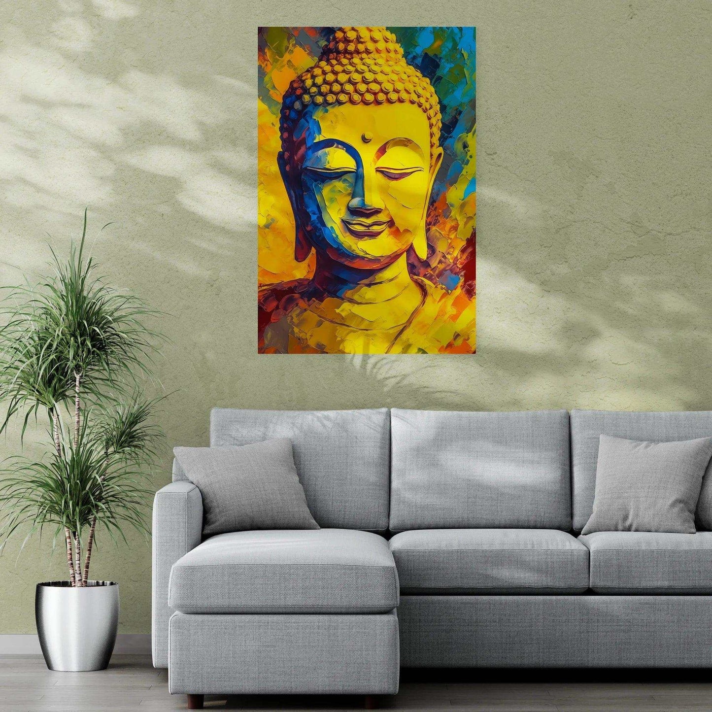 A colorful Buddha portrait with abstract blue and orange details hangs on a textured wall, adding a touch of serenity to a modern living space with a light gray sectional sofa and a potted plant.