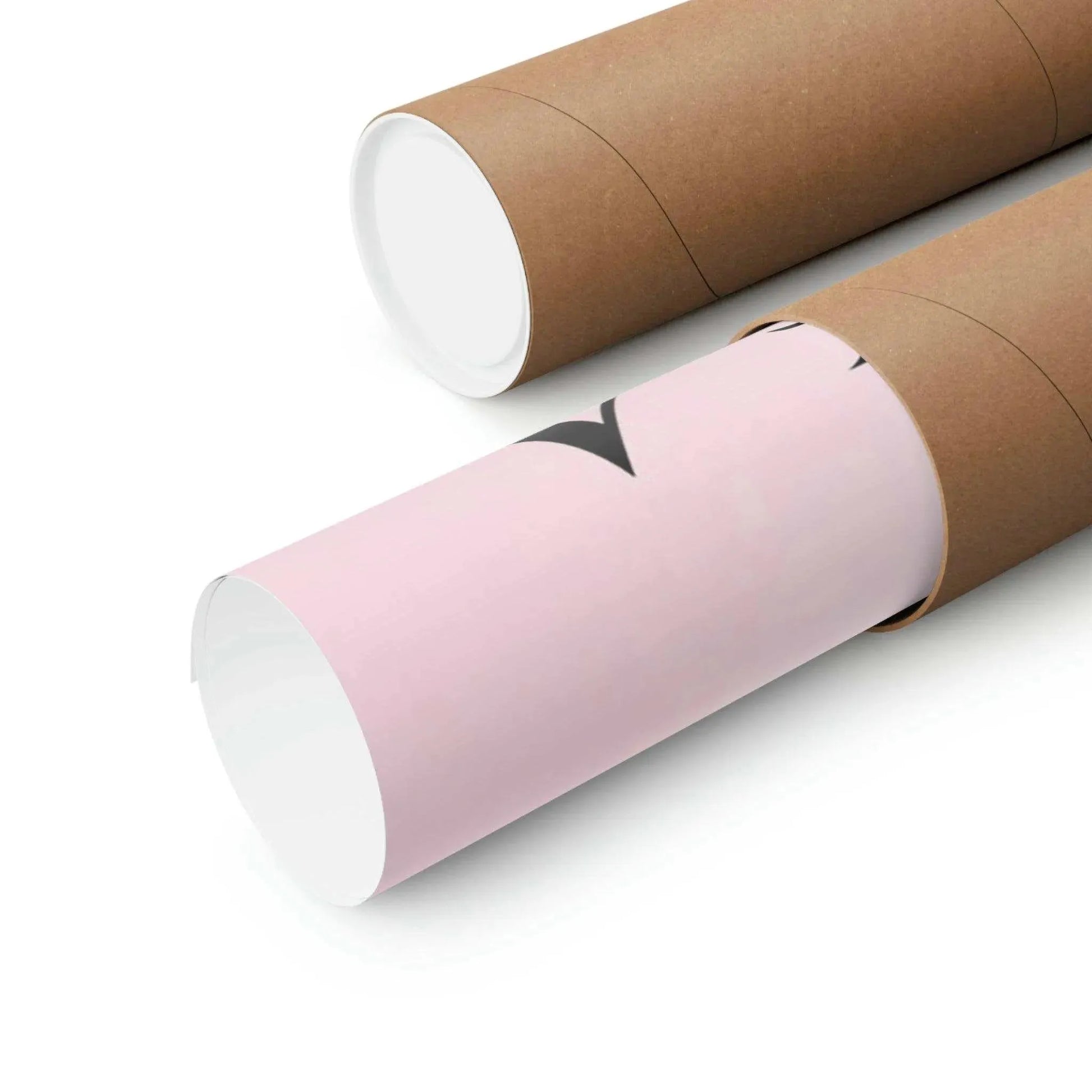 On a white surface, two brown cardboard tubes lie next to each other. One is partially opened, revealing the Timeless Buddha Poster by Printify with a rolled pink design featuring a small touch of black. This art piece hints at the mindfulness and inner peace it can inspire.