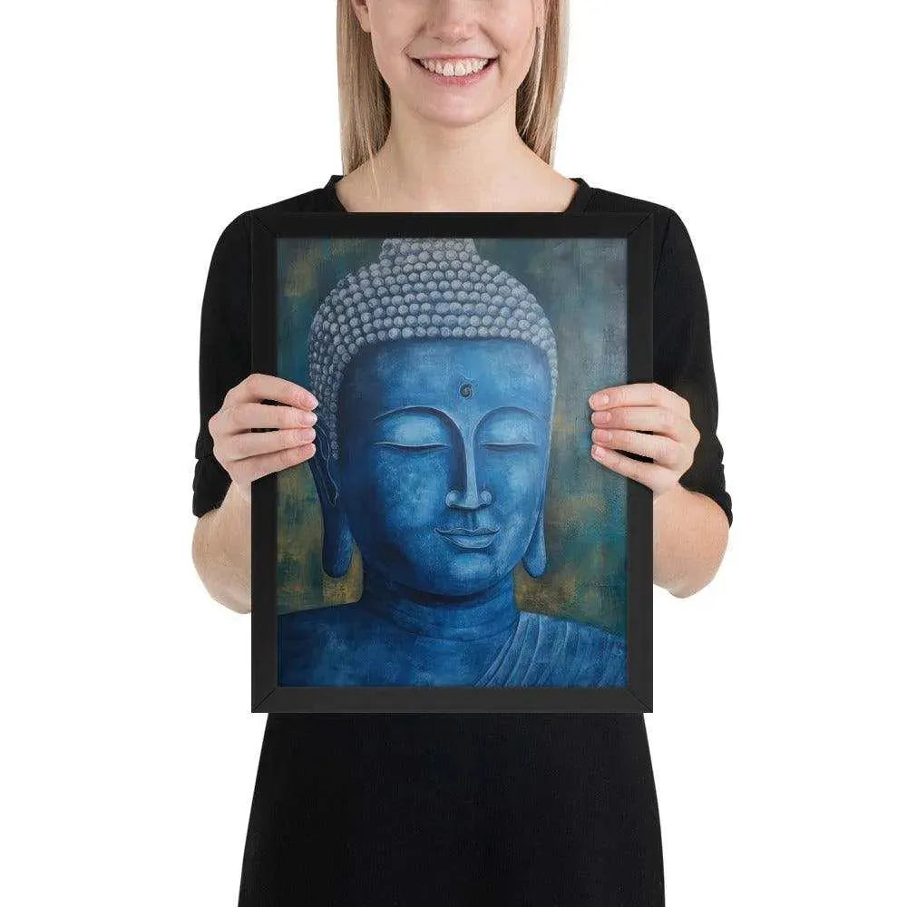 A smiling woman in a black top is displaying a black oak framed poster featuring a serene, monochromatic Blue Buddha Healing Art with a textured background that adds depth to the peaceful visage.