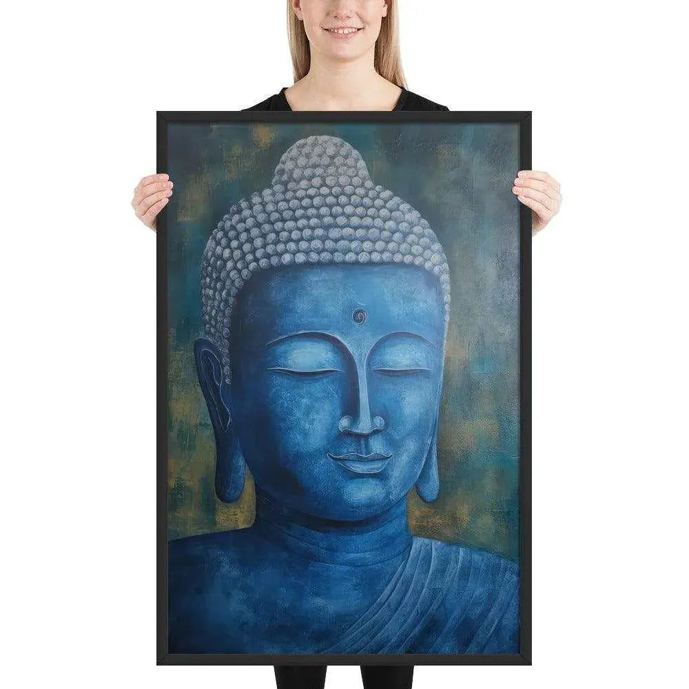 A smiling woman in a black top is displaying a black oak framed poster featuring a serene, monochromatic Blue Buddha Healing Art with a textured background that adds depth to the peaceful visage.