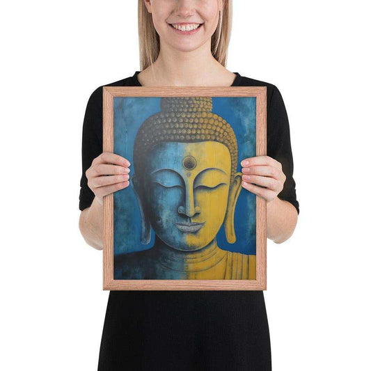 A cheerful woman is holding a red oak framedTibetan Blue Buddha Painting  that depicts a half gold, half blue Buddha face against a complementary blue background, blending spirituality with a modern art style.